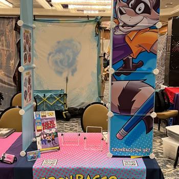 Half-table setup from Texas Furry Fiesta '25